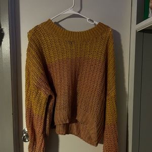 pink and yellow sweater